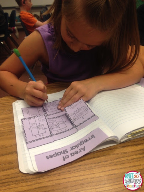 girl working on interactive notebooks