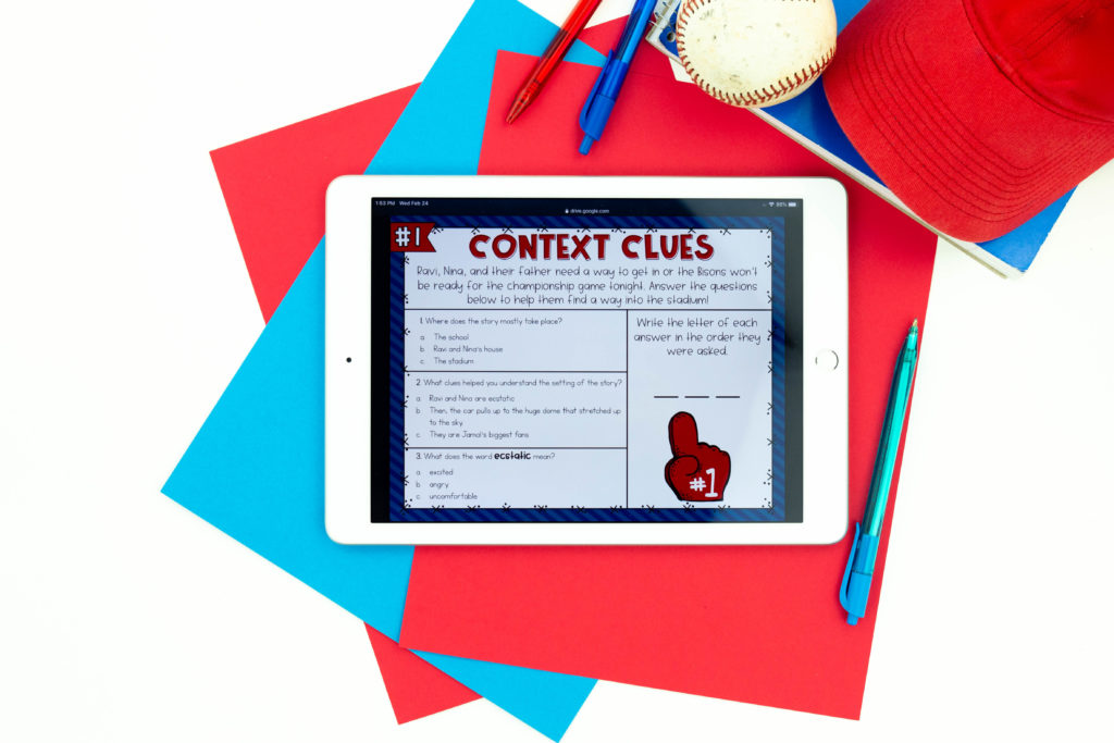 Context clue activity on white iPad with baseball, cap and pens